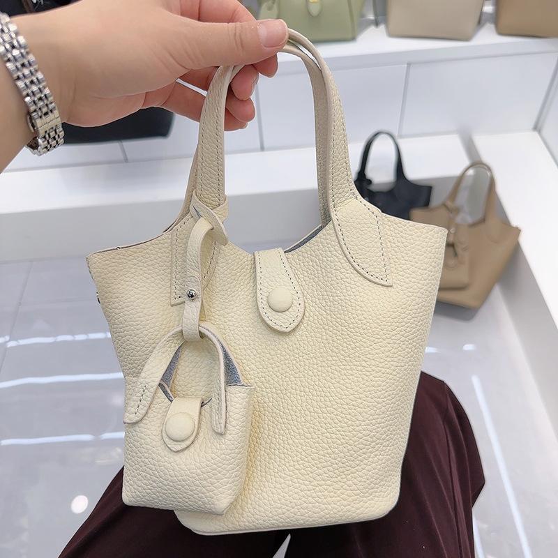 Нишевая дизайнерская сумочка, универсальная сумка-ведро для женщин для работы весной, и сумка через плечо с одним ремнем
Нишевая дизайнерская сумочка, универсальная сумка-ведро для женщин для работы весной, и сумка через плечо с одним ремнем