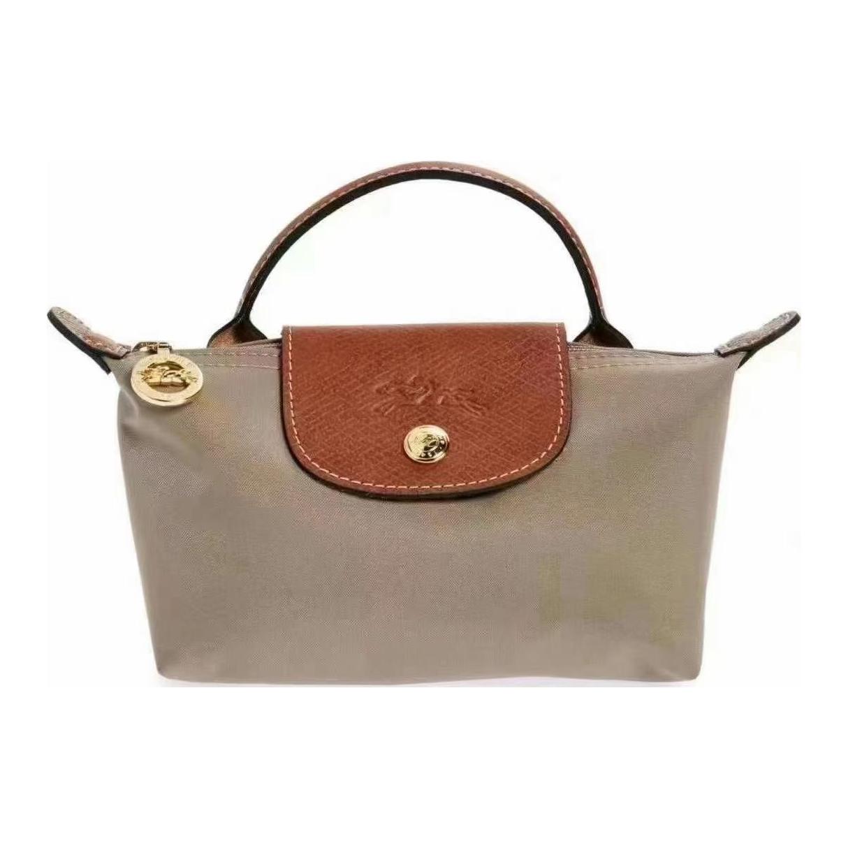Longchamp Le Pliage Original Short Handle Snap Zipper Canvas With Leather Trim Tote Bag Unisex tote bag Dove-Gray 34175089P18 Basic Set (Bag)
Longchamp Le Pliage Original Short Handle Snap Zipper Canvas With Leather Trim Tote Bag Unisex tote bag Dove-Gray 34175089P18 Basic Set (Bag)
