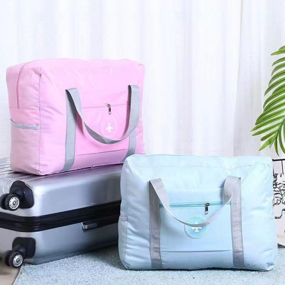 Large Capacity Travel Storage Bag Folding Trip Handbag Portable Travel Luggage Bag Women синій
Large Capacity Travel Storage Bag Folding Trip Handbag Portable Travel Luggage Bag Women синій
