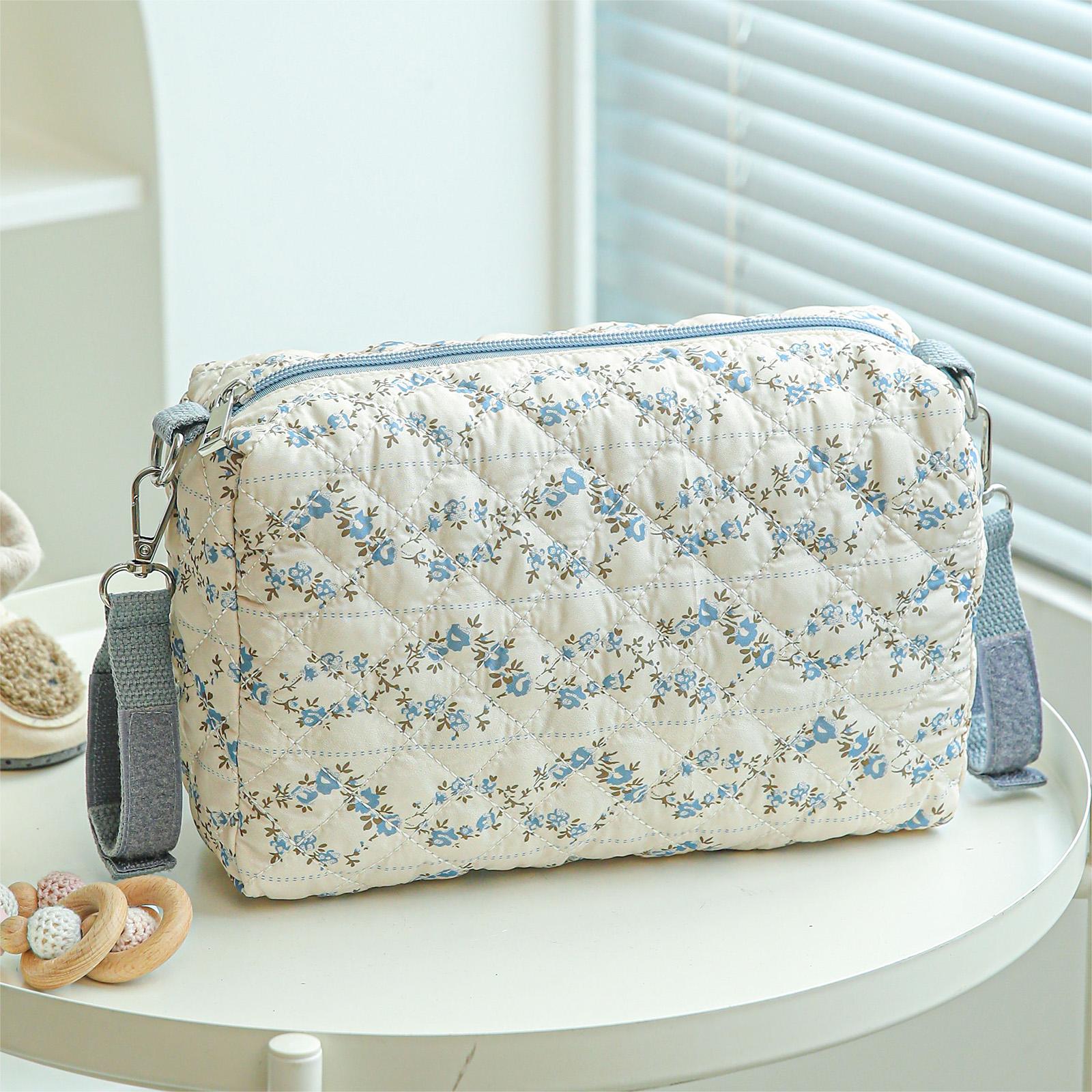 Floral Nappy Diaper Storage Bag Multifunctional Reusable Portable Stroller Organizer Bags with Stroller Hooks for All Strollers
Floral Nappy Diaper Storage Bag Multifunctional Reusable Portable Stroller Organizer Bags with Stroller Hooks for All Strollers
