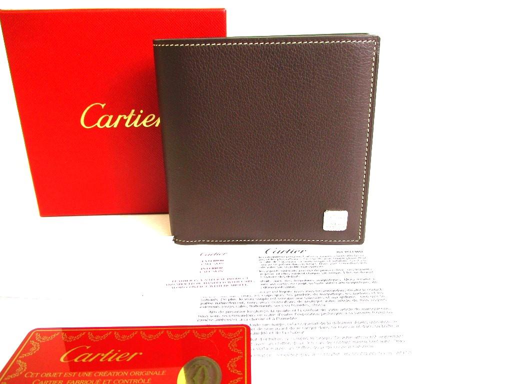Автентичний гаманець Cartier C de Cartier темно-коричневий зі складеної шкіри №9253 відремонтований 
Автентичний гаманець Cartier C de Cartier темно-коричневий зі складеної шкіри №9253 відремонтований