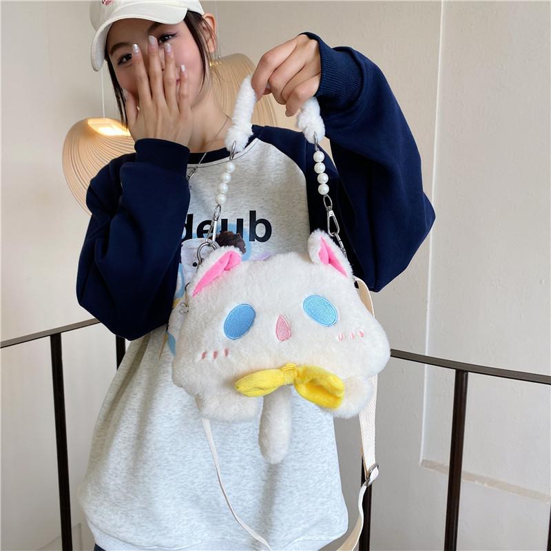 Cute kitten oblique shoulder bag, wind girl plush doll bag, sweet cat girl handbag. білий
Cute kitten oblique shoulder bag, wind girl plush doll bag, sweet cat girl handbag. білий