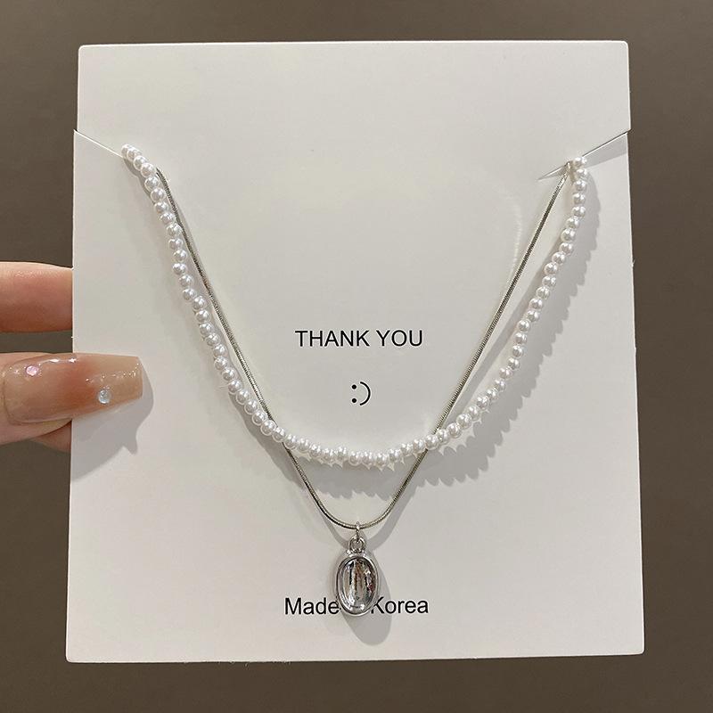 Double-layer small rice grain pearl necklace women s retro French stacked collarbone chain light luxury niche design neck chain accessories
Double-layer small rice grain pearl necklace women s retro French stacked collarbone chain light luxury niche design neck chain accessories