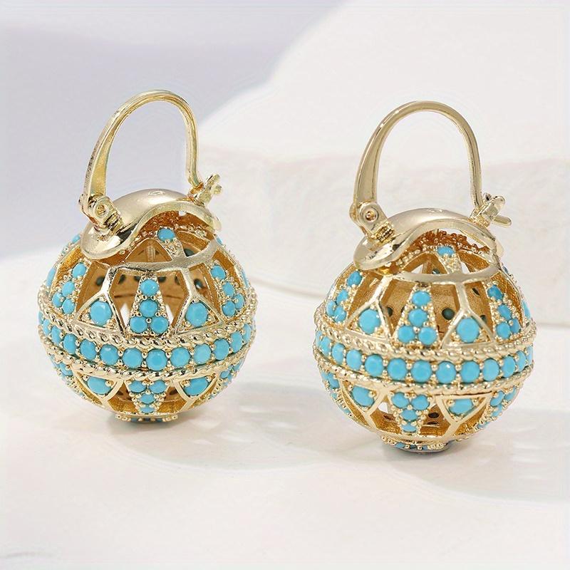 Ethnic Design Gold Color Inlaid Imitation Turquoise Women s Earrings Vintage Metal Circular Sphere Dangle Earrings Woman золотий
Ethnic Design Gold Color Inlaid Imitation Turquoise Women s Earrings Vintage Metal Circular Sphere Dangle Earrings Woman золотий