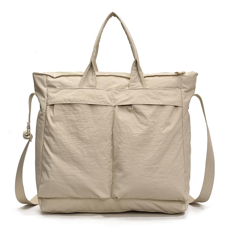 Single Shoulder Korean Version Lazy Casual Crossbody Bag for Women Commuting, Hand-held Tote Bag with Multiple Pockets, Mailman Bag світлого кольору хакі
Single Shoulder Korean Version Lazy Casual Crossbody Bag for Women Commuting, Hand-held Tote Bag with Multiple Pockets, Mailman Bag світлого кольору хакі