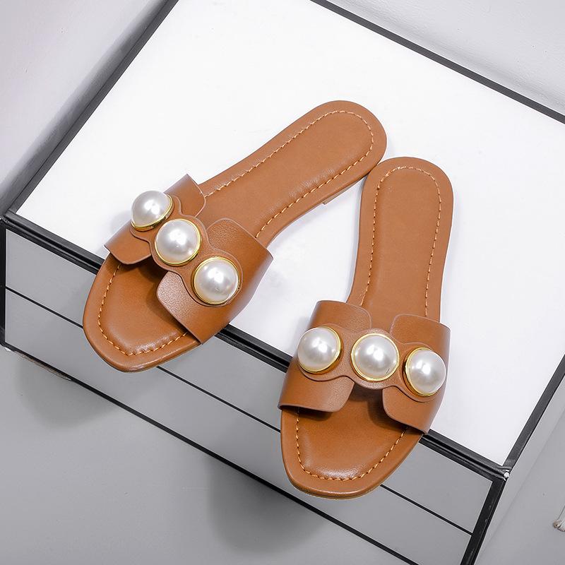 One-word flat-bottomed cool slippers female fashion pearl outer wear versatile comfortable fairy beach slim sandals 35 светло-коричневого
One-word flat-bottomed cool slippers female fashion pearl outer wear versatile comfortable fairy beach slim sandals 35 светло-коричневого