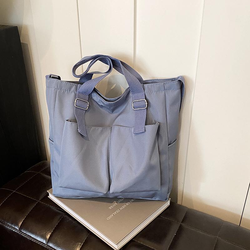 Large capacity women s bag leisure 2025 new tote bag Korean version simple trend personalized fashion beautiful shoulder bag синий
Large capacity women s bag leisure 2025 new tote bag Korean version simple trend personalized fashion beautiful shoulder bag синий