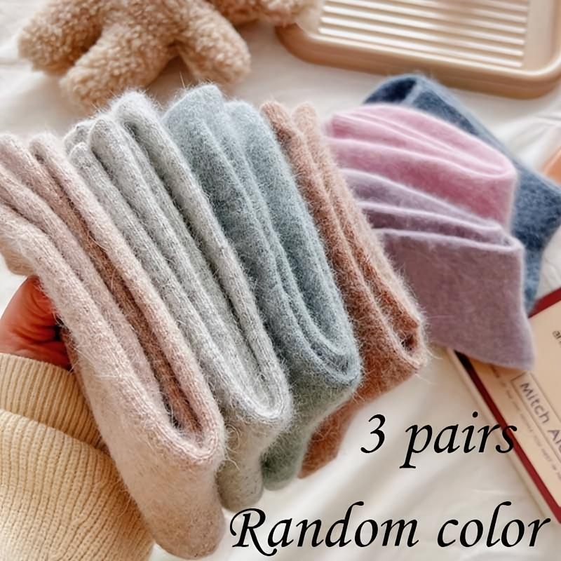 Three pairs of winter women s socks, mid-calf soft socks, thickened warm solid-color socks, simple design
Three pairs of winter women s socks, mid-calf soft socks, thickened warm solid-color socks, simple design