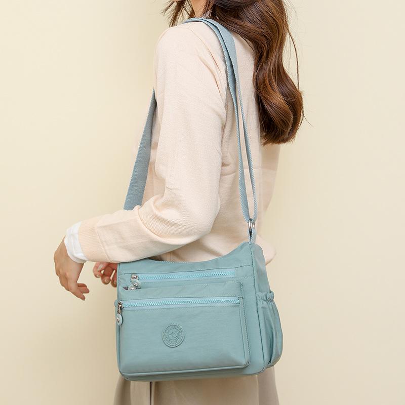 Backpack new casual simple nylon small square bag shoulder messenger bag women темно-синього кольору
Backpack new casual simple nylon small square bag shoulder messenger bag women темно-синього кольору