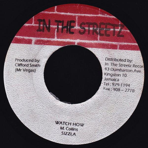 7-дюймовая пластинка SIZZLA - Watch How NONE In The Streetz 2003 Япония Регги, Ска и Даб Б/У
7-дюймовая пластинка SIZZLA - Watch How NONE In The Streetz 2003 Япония Регги, Ска и Даб Б/У