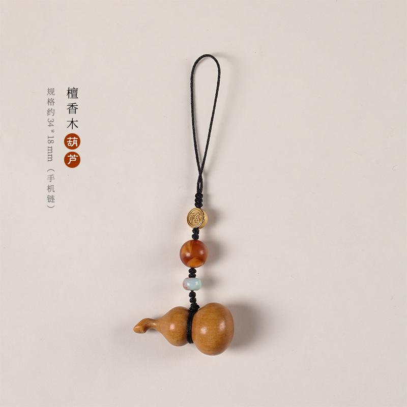 Creative Chinese-style high-end sandalwood small gourd phone chain pendant U Pendant for hanging on a bag, suitable for couples Sandalwood-Gourd【Mobile
Creative Chinese-style high-end sandalwood small gourd phone chain pendant U Pendant for hanging on a bag, suitable for couples Sandalwood-Gourd【Mobile