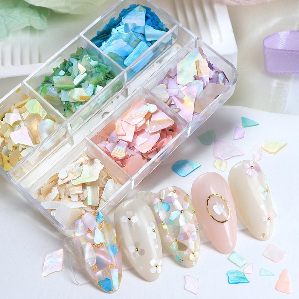 1 Box 3D Irregular Shell Marble Nail Art Charms, Mermaid Aurora Flake Nail Accessories Shell Stones Rhinestones for Nail Art Decorations and Supplies
1 Box 3D Irregular Shell Marble Nail Art Charms, Mermaid Aurora Flake Nail Accessories Shell Stones Rhinestones for Nail Art Decorations and Supplies