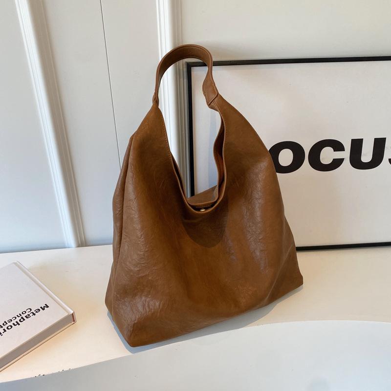 Autumn and Winter Vintage Large Capacity Bag, New Trendy and Explosive, Stylish and Versatile Shoulder Bag, Fashionable Bucket Bag коричневий
Autumn and Winter Vintage Large Capacity Bag, New Trendy and Explosive, Stylish and Versatile Shoulder Bag, Fashionable Bucket Bag коричневий
