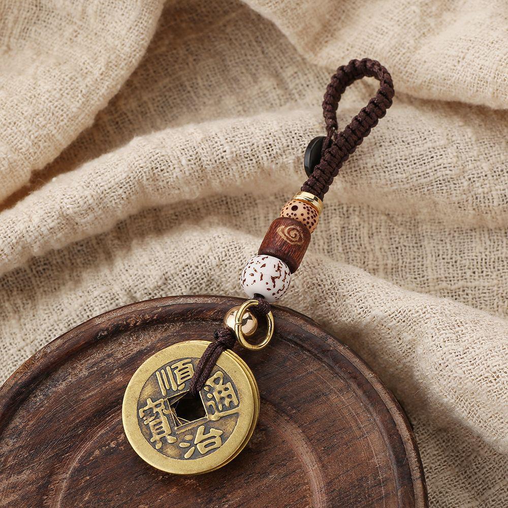 Брелок для денег Five Emperors из латуни с подвеской из желтой и красной веревки
Брелок для денег Five Emperors из латуни с подвеской из желтой и красной веревки