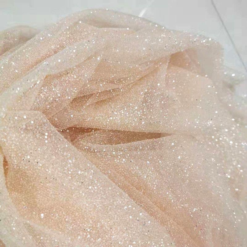 The fabric is made of shiny sequin and slightly stiff It can be used for wedding dresses formal gowns and designer clothing 1.5M&1M
The fabric is made of shiny sequin and slightly stiff It can be used for wedding dresses formal gowns and designer clothing 1.5M&1M