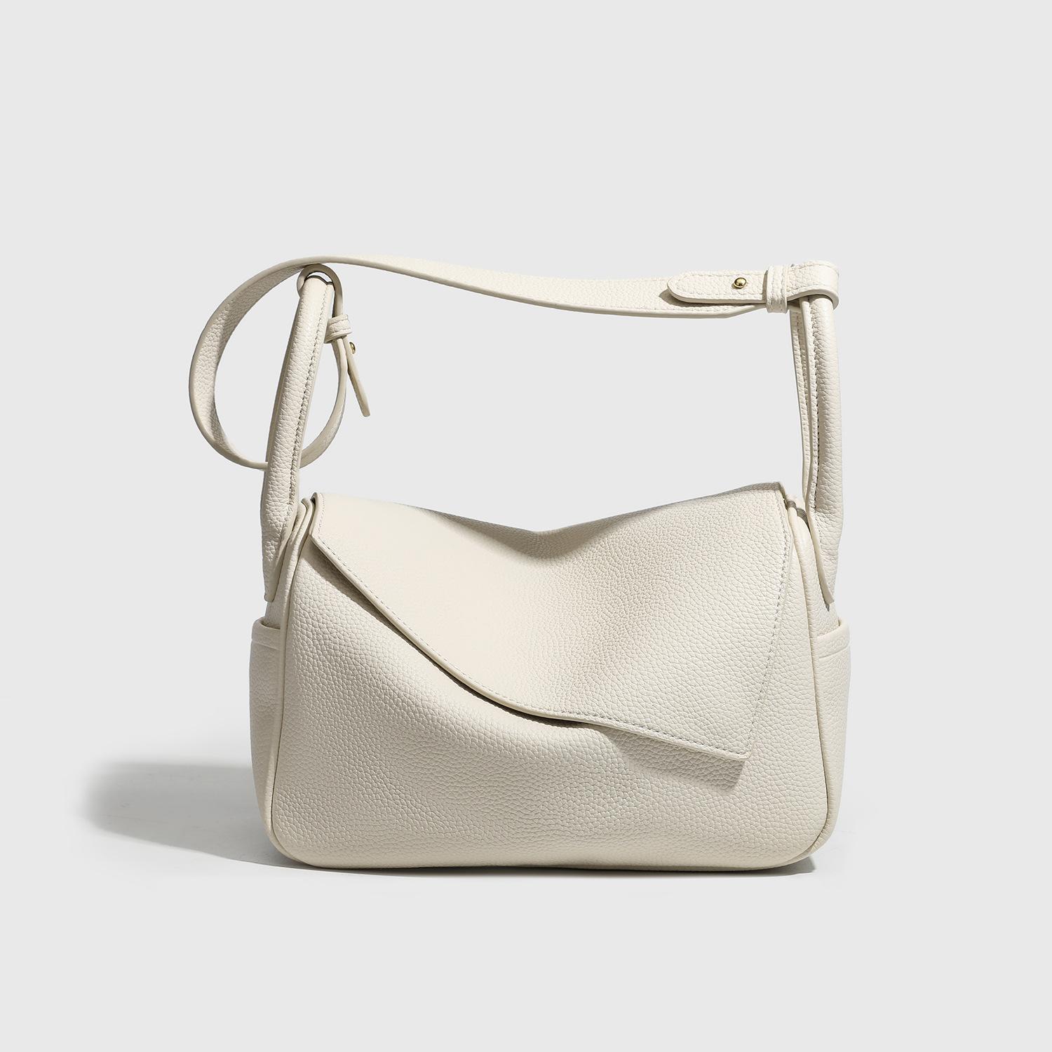 New versatile lychee-pattern soft leather cigarette case bag for women, niche retro high-end handbag, shoulder and crossbody bag for women 25*12*17CM бежевий
New versatile lychee-pattern soft leather cigarette case bag for women, niche retro high-end handbag, shoulder and crossbody bag for women 25*12*17CM бежевий