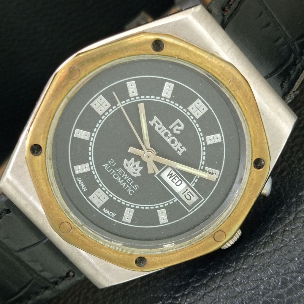 VINTAGE RICOH R31 AUTOMATIC JAPAN MENS BLACK COLOR DIAL WATCH a707921-1
VINTAGE RICOH R31 AUTOMATIC JAPAN MENS BLACK COLOR DIAL WATCH a707921-1