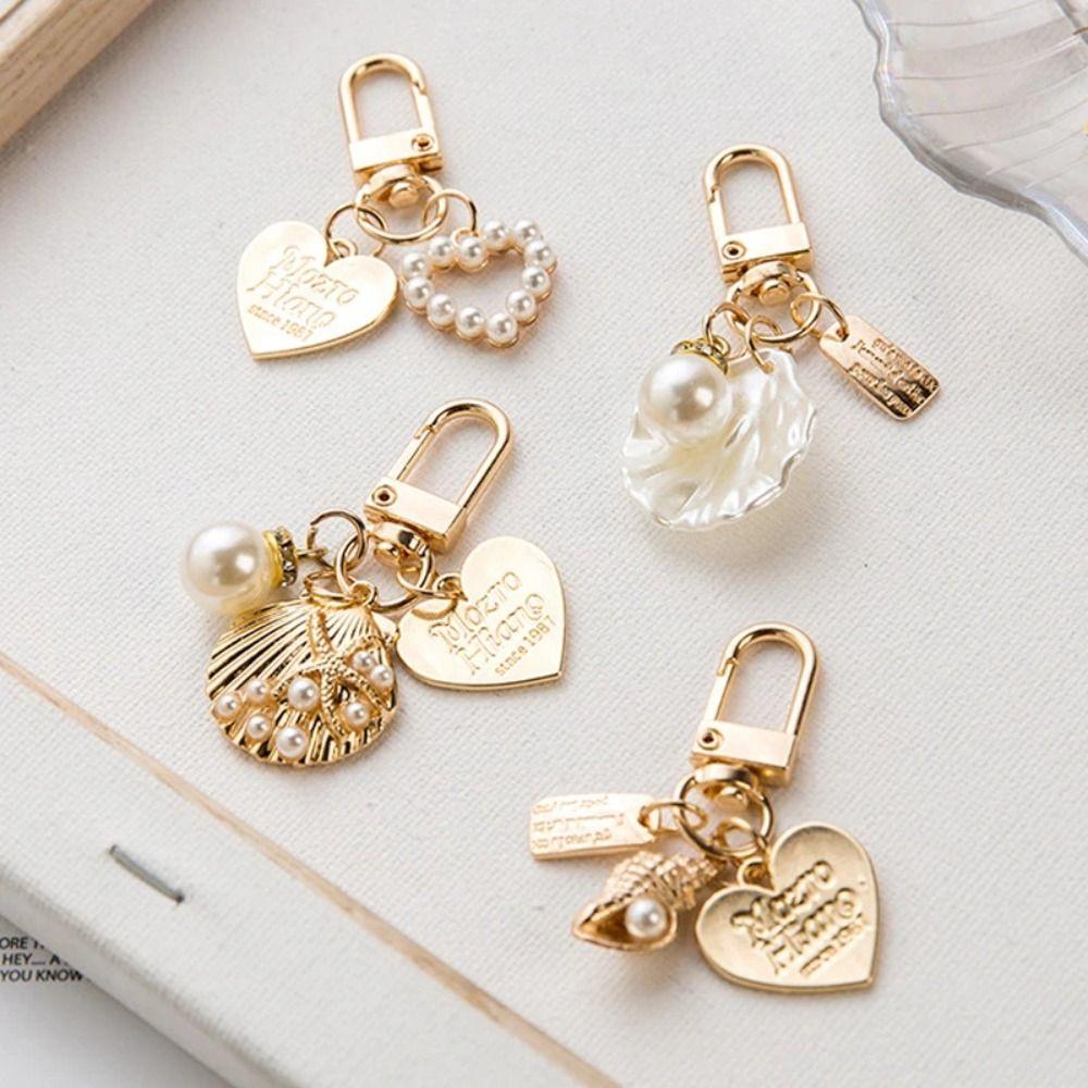 Брелок для ключей Charms Metal Pearl, элегантный брелок из цинкового сплава с жемчугом, винтажные брелки с жемчугом для девочек
Брелок для ключей Charms Metal Pearl, элегантный брелок из цинкового сплава с жемчугом, винтажные брелки с жемчугом для девочек