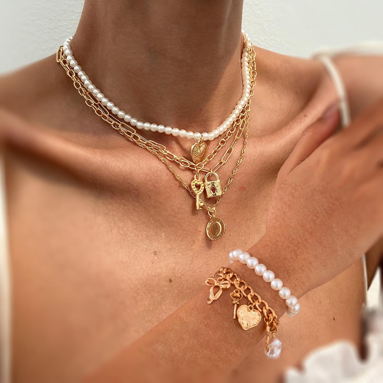 French beaded heart-shaped multi-pendant item jewelry, temperament pearl rose bow necklace
French beaded heart-shaped multi-pendant item jewelry, temperament pearl rose bow necklace