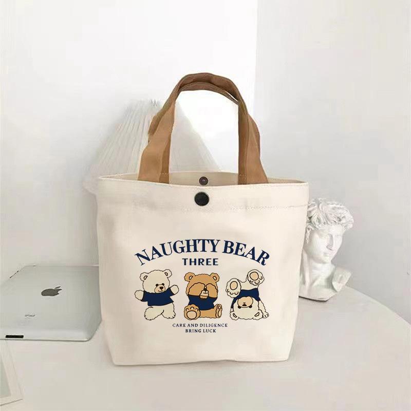 Canvas Tote Bag with Printed Bear Design Lightweight Durable Handbag for Daily Use Casual Carrying with Button Closure and Comfortable Handles One Size
Canvas Tote Bag with Printed Bear Design Lightweight Durable Handbag for Daily Use Casual Carrying with Button Closure and Comfortable Handles One Size
