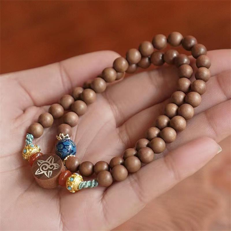 Indian Sandalwood Sun Moon Stars Bracelet with Lacquer Beads and Gold-Plated Dragonfly Eye Pure Natural
Indian Sandalwood Sun Moon Stars Bracelet with Lacquer Beads and Gold-Plated Dragonfly Eye Pure Natural