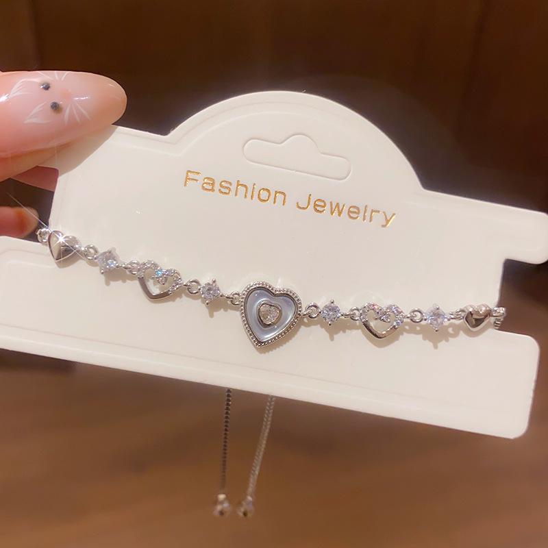 Elegant Korean Zircon Mother-of-Pearl Heart Bracelet - Exquisite, Versatile, and Luxurious Jewelry Piece
Elegant Korean Zircon Mother-of-Pearl Heart Bracelet - Exquisite, Versatile, and Luxurious Jewelry Piece