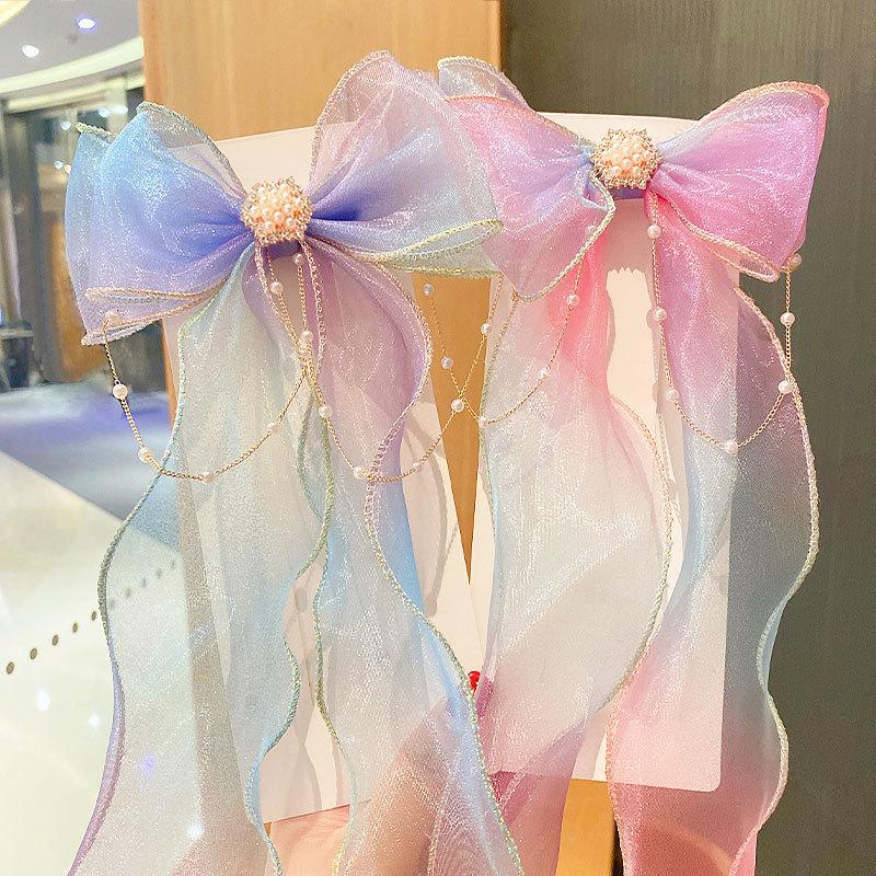 Girls Cute Elegant Mesh Bow Ribbon Hair Clip with Faux Pearl Tassel Crystal Decoration Colorful Chiffon Headwear for Party Kids 2pcs
Girls Cute Elegant Mesh Bow Ribbon Hair Clip with Faux Pearl Tassel Crystal Decoration Colorful Chiffon Headwear for Party Kids 2pcs