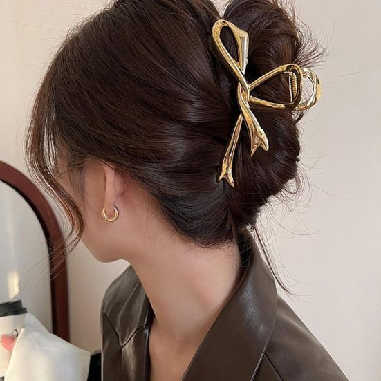 Женский коготь для волос в форме банта, полый из полированной нержавеющей стали, сильный коготь, противоскользящий, эластичный, весенний, женский зажим для волос, машинка для стрижки волос 
Женский коготь для волос в форме банта, полый из полированной нержавеющей стали, сильный коготь, противоскользящий, эластичный, весенний, женский зажим для волос, машинка для стрижки волос