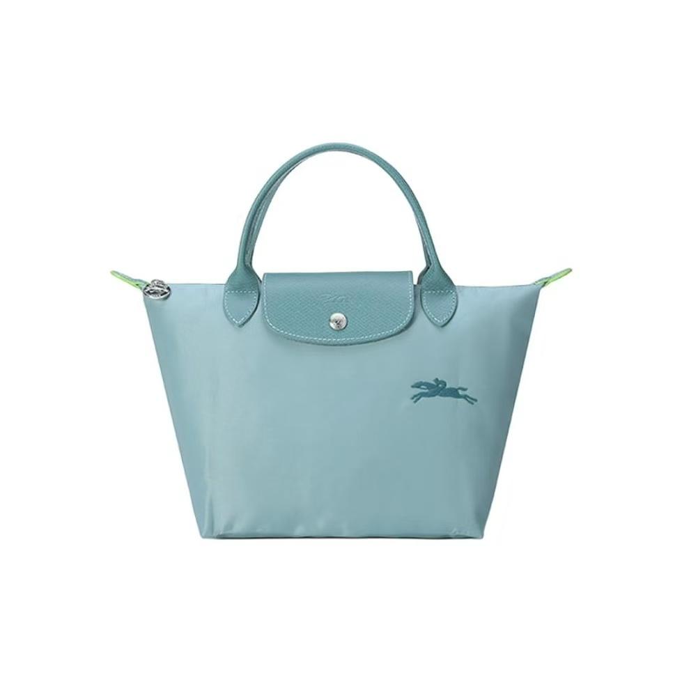 Longchamp Le Pliage Green 23 Brand Logo Magnetic Closure Canvas Tote Shopping Bag Recycled Canvas And Leather Handbag Small Women Tote 1621919P65 Basic Set (Bag)
Longchamp Le Pliage Green 23 Brand Logo Magnetic Closure Canvas Tote Shopping Bag Recycled Canvas And Leather Handbag Small Women Tote 1621919P65 Basic Set (Bag)