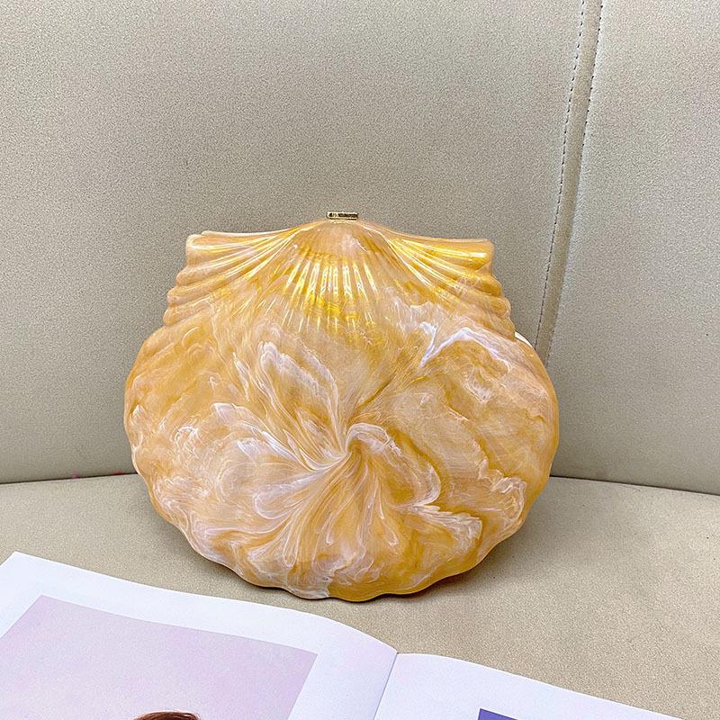 Fashion temperament shell bag metal retro stone pattern amber dinner party messenger bag
Fashion temperament shell bag metal retro stone pattern amber dinner party messenger bag