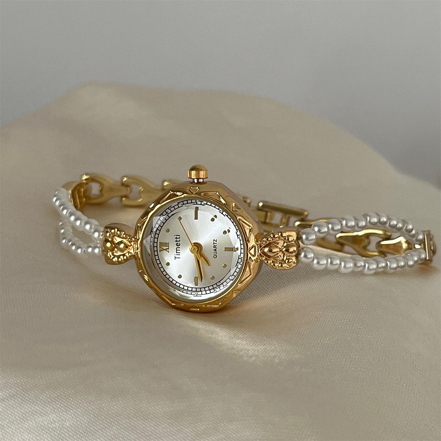 Timetti Pearl Fine Bracelet Retro Niche Light Luxury Exquisite Women S Fashion Small Fragrant Quartz Watch золотий
Timetti Pearl Fine Bracelet Retro Niche Light Luxury Exquisite Women S Fashion Small Fragrant Quartz Watch золотий