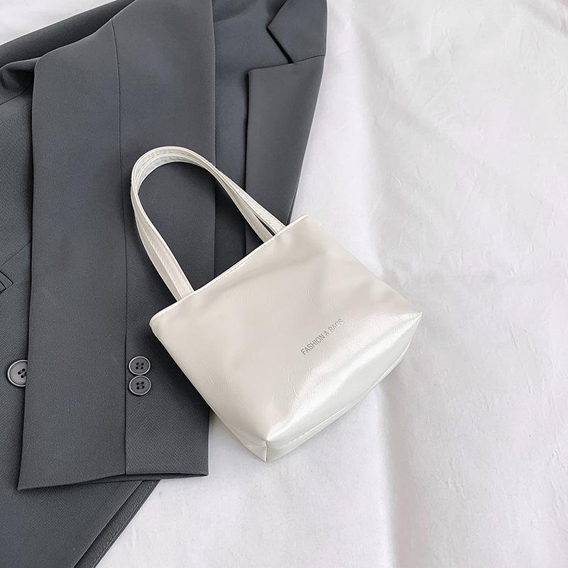 New niche tote bag summer simple and versatile solid color simple hand bag casual commute белый
New niche tote bag summer simple and versatile solid color simple hand bag casual commute белый