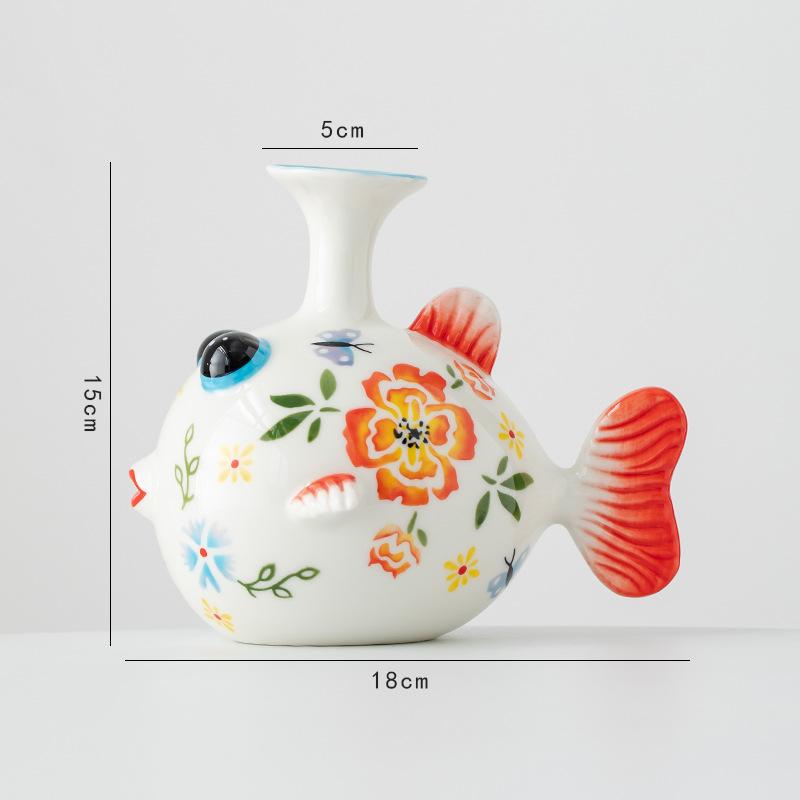 Small fish hand-painted ceramic decoration dried flower vase, living room foyer dining table flower arrangement ornament
Small fish hand-painted ceramic decoration dried flower vase, living room foyer dining table flower arrangement ornament