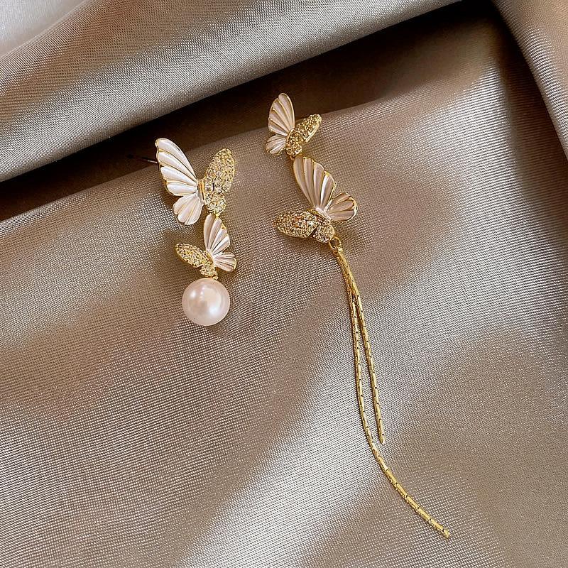 Holiday style pearl butterfly fringed earrings high-end light luxury stud earrings new retro fashion versatile earrings
Holiday style pearl butterfly fringed earrings high-end light luxury stud earrings new retro fashion versatile earrings