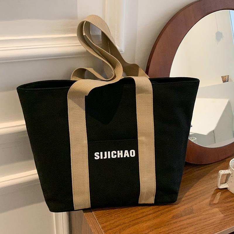 Жіноча полотняна сумка великої місткості 2024, нова універсальна тканинна сумка через плече, повсякденна приміська сумка для старших класів чорний
Жіноча полотняна сумка великої місткості 2024, нова універсальна тканинна сумка через плече, повсякденна приміська сумка для старших класів чорний