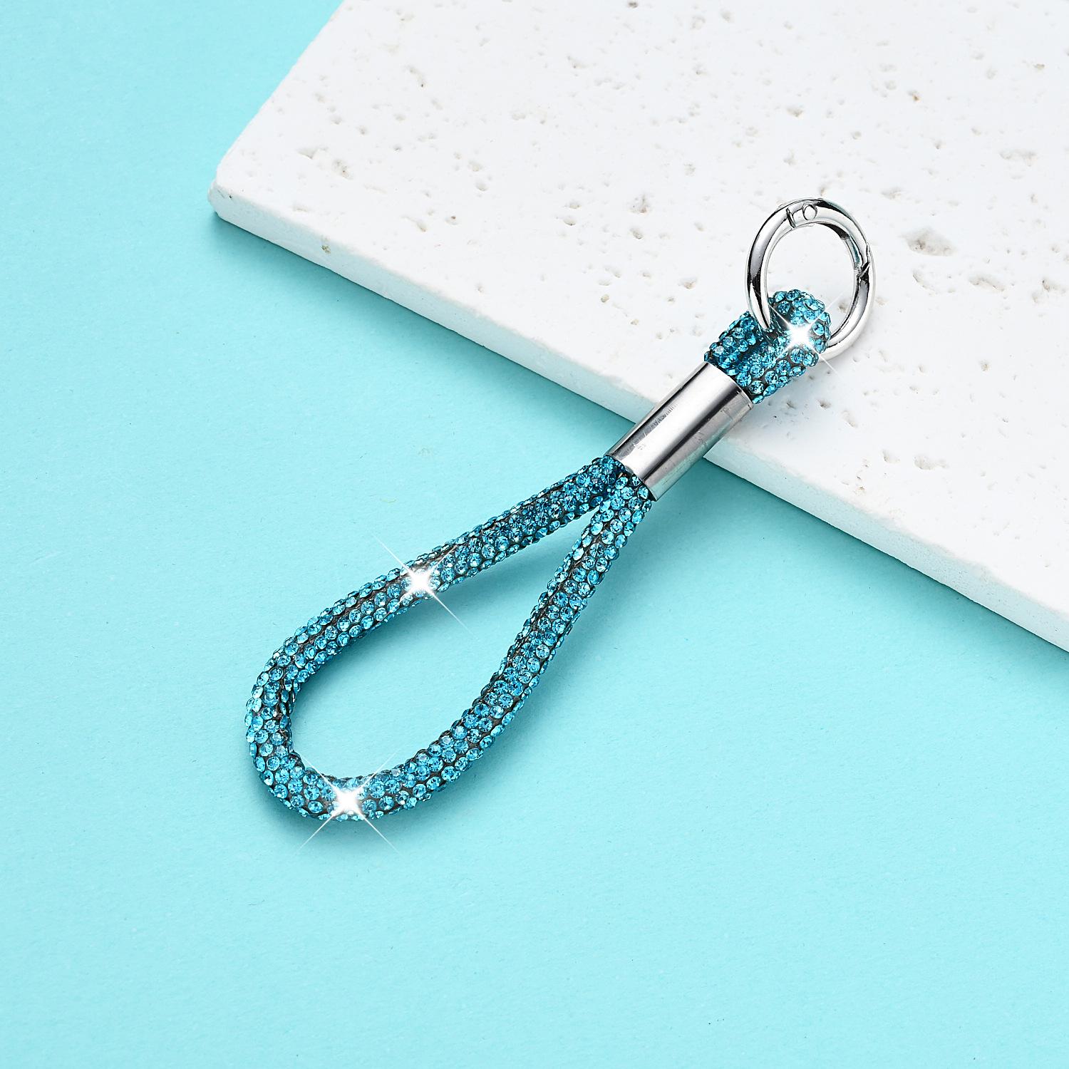 Модный ремешок для телефона со стразами - Брелок с бриллиантовой подвеской против потери.
Модный ремешок для телефона со стразами - Брелок с бриллиантовой подвеской против потери.