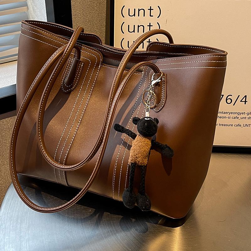 Велика сумка жіноча сумка 2025 нова мода осінь і зима повсякденна універсальна сумка через плече преміальна сумка-тоут
Велика сумка жіноча сумка 2025 нова мода осінь і зима повсякденна універсальна сумка через плече преміальна сумка-тоут