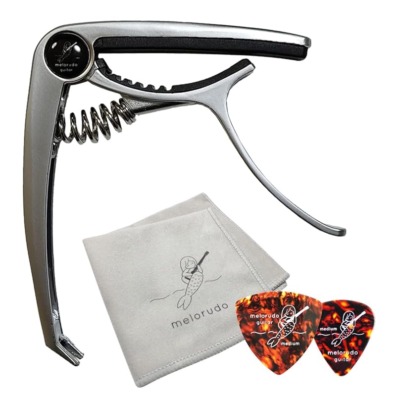 melorudo guitar capo (Silver) 2 types of guitar cross picks with logo included. ma100011c01n0
melorudo guitar capo (Silver) 2 types of guitar cross picks with logo included. ma100011c01n0