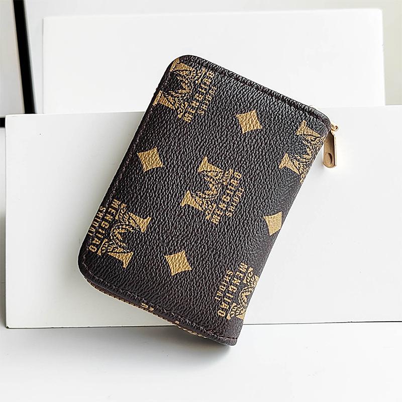 Guangzhou women s bag new printed short wallet hand grab bag women s simple wallet small card bag
Guangzhou women s bag new printed short wallet hand grab bag women s simple wallet small card bag