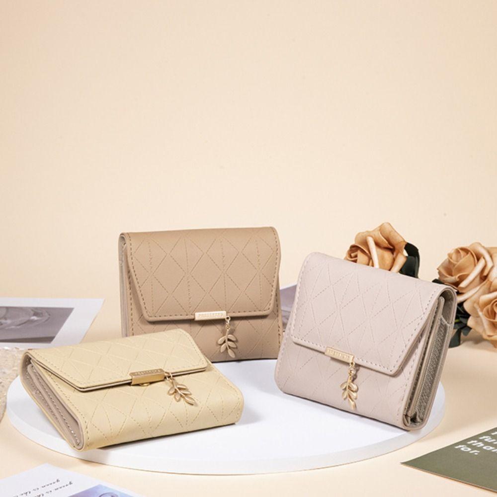 Портмоне с подвеской в виде листа, портативная сумка для денег, новый кошелек Zero для девочек
Портмоне с подвеской в виде листа, портативная сумка для денег, новый кошелек Zero для девочек