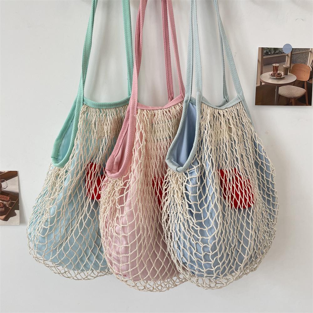 Summer seaside play net pocket simple niche woven women s bag fashion shoulder bag shopping fishing net bag синій
Summer seaside play net pocket simple niche woven women s bag fashion shoulder bag shopping fishing net bag синій