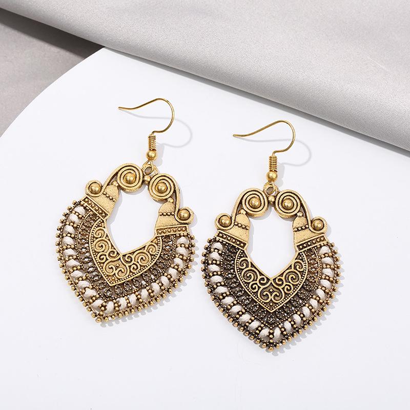 Bohemian Vintage Fashion Rope Wrap Earrings For Women Carved Hollow Geometric Drop Dangle India Earrings Boho Zircon Wholesale
Bohemian Vintage Fashion Rope Wrap Earrings For Women Carved Hollow Geometric Drop Dangle India Earrings Boho Zircon Wholesale