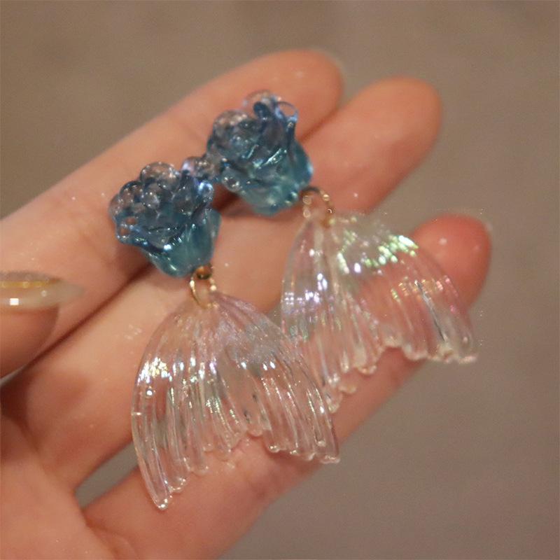 Holiday style flower fishtail earrings personalized fashion stud earrings ins wind small fresh natural versatile earrings women
Holiday style flower fishtail earrings personalized fashion stud earrings ins wind small fresh natural versatile earrings women