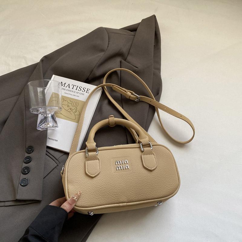 Новая модная сумка-боулинг, портативная, на плечо, мессенджер, женская сумка
Новая модная сумка-боулинг, портативная, на плечо, мессенджер, женская сумка