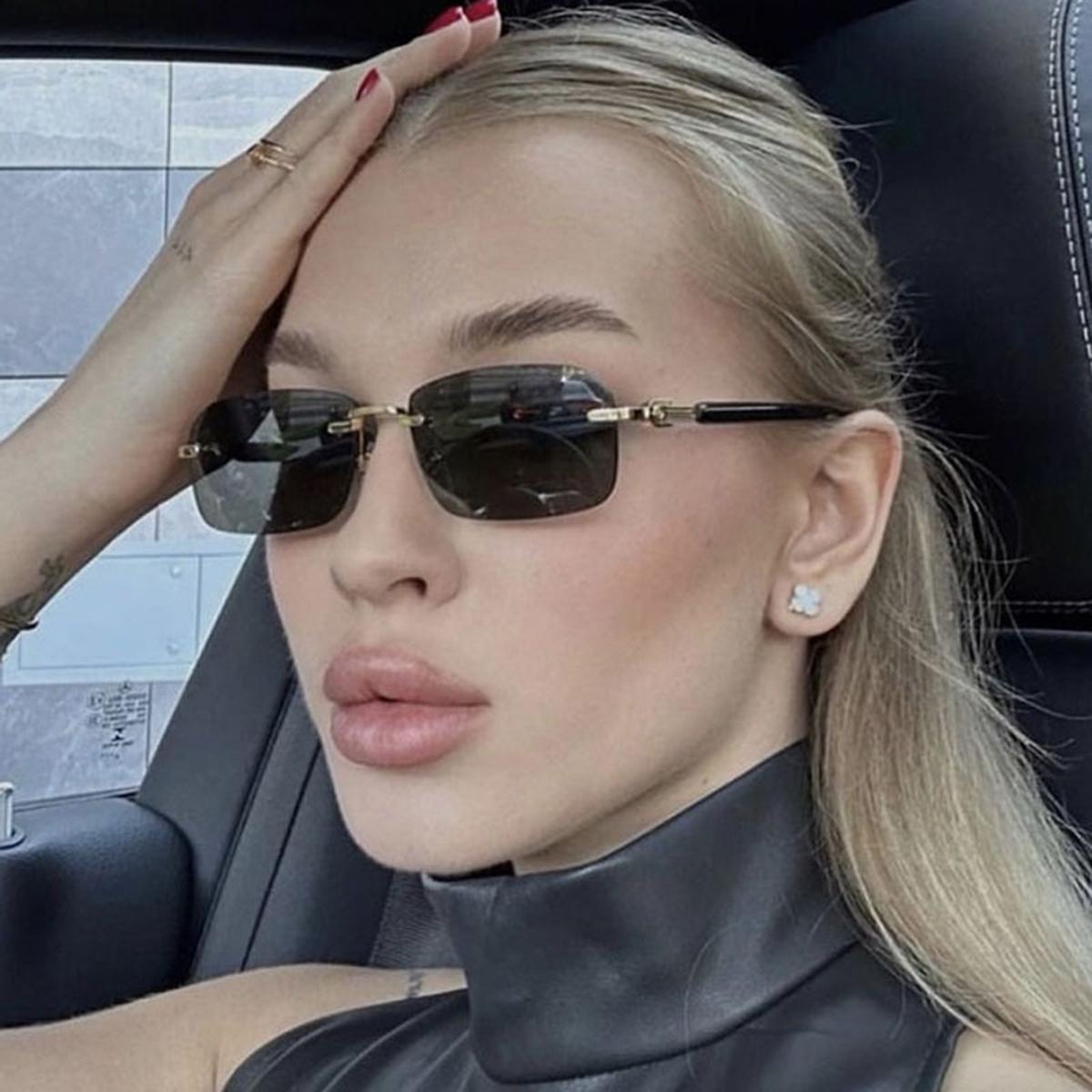 New European and American Rimless Sunglasses Metal Sunglasses Advanced Sense of Driving Men and Women Personality Trend Trimming. коричневий
New European and American Rimless Sunglasses Metal Sunglasses Advanced Sense of Driving Men and Women Personality Trend Trimming. коричневий