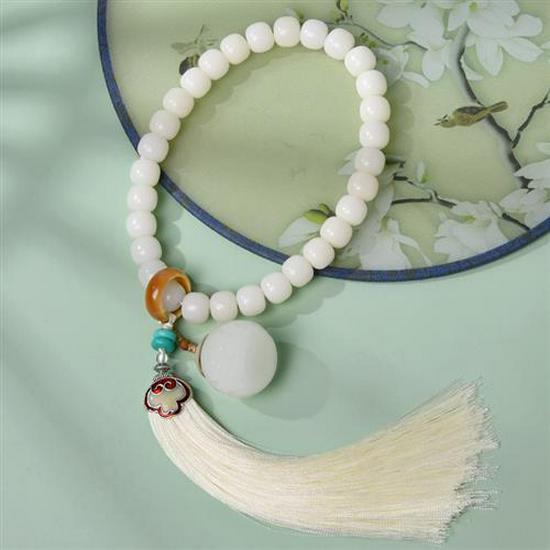 White Jade Bodhi Seed Luminous Stone Handheld Tassel Prayer Beads Bracelet
White Jade Bodhi Seed Luminous Stone Handheld Tassel Prayer Beads Bracelet