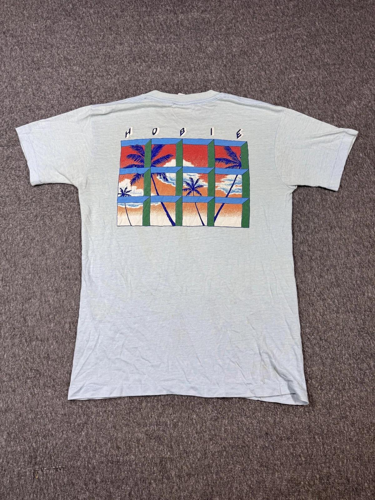 Vintage Hobie Shirt Mens XL Blue Palm Tree Graphic Made USA Surf Skate 80s Tee 4XL
Vintage Hobie Shirt Mens XL Blue Palm Tree Graphic Made USA Surf Skate 80s Tee 4XL
