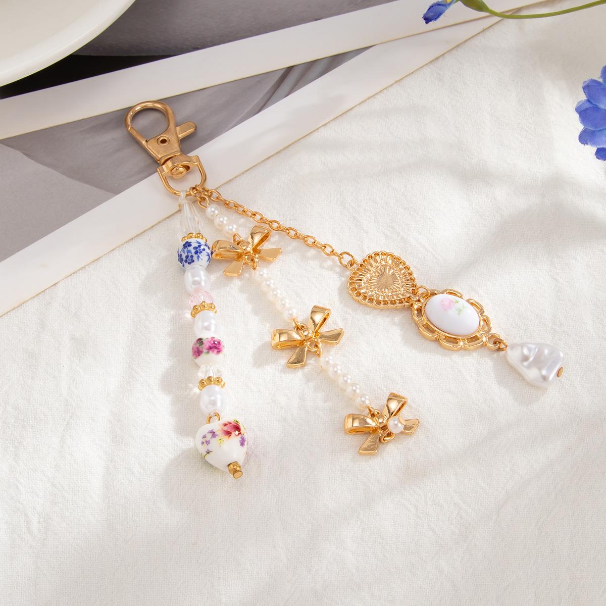 Chinese Style Blue And White Ceramic Flower Trouser Chain Keychain, Niche Love Bow Pearl Pendant
Chinese Style Blue And White Ceramic Flower Trouser Chain Keychain, Niche Love Bow Pearl Pendant