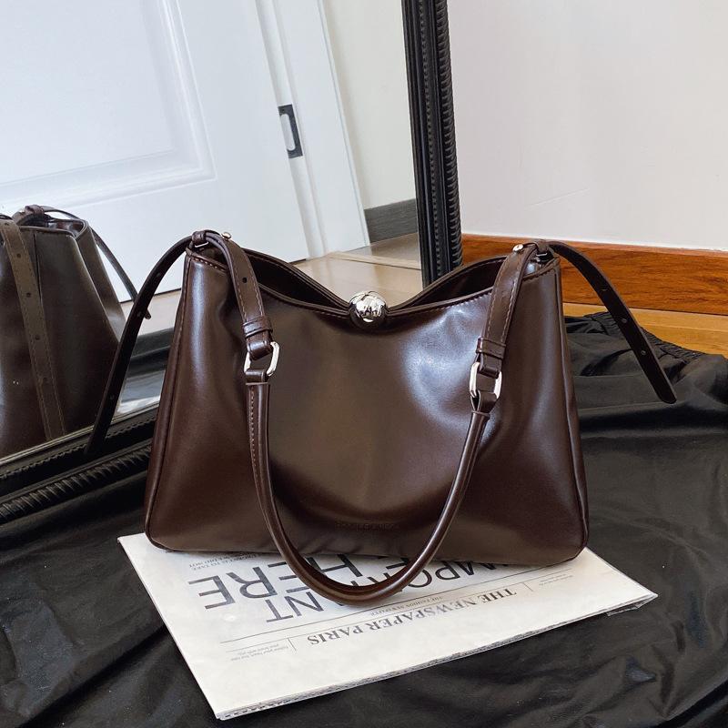 Мягкая кожаная женская сумка подмышкой Niche Design, женская сумка из масляно-вощеной кожи, темпераментная сумка на одно плечо подмышкой
Мягкая кожаная женская сумка подмышкой Niche Design, женская сумка из масляно-вощеной кожи, темпераментная сумка на одно плечо подмышкой