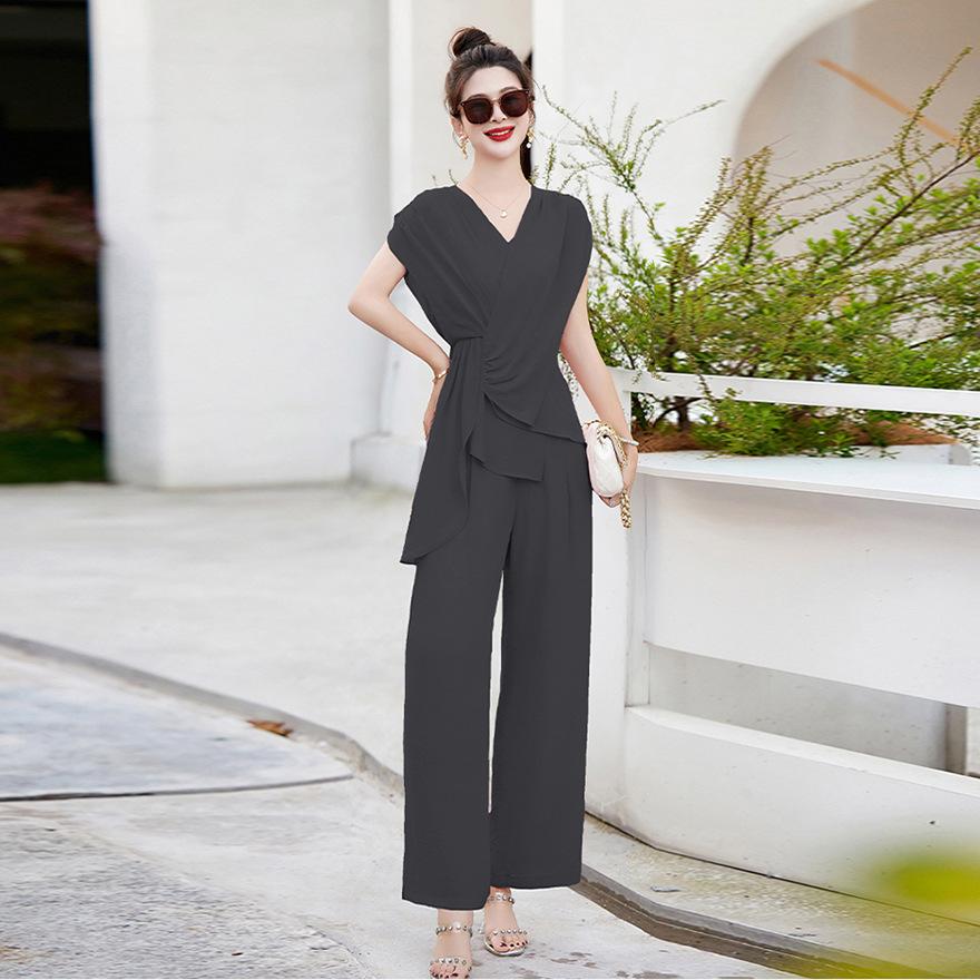 Summer new age reduction, a complete set of fashion design, irregular top, trousers, two-piece set for women M чорний
Summer new age reduction, a complete set of fashion design, irregular top, trousers, two-piece set for women M чорний